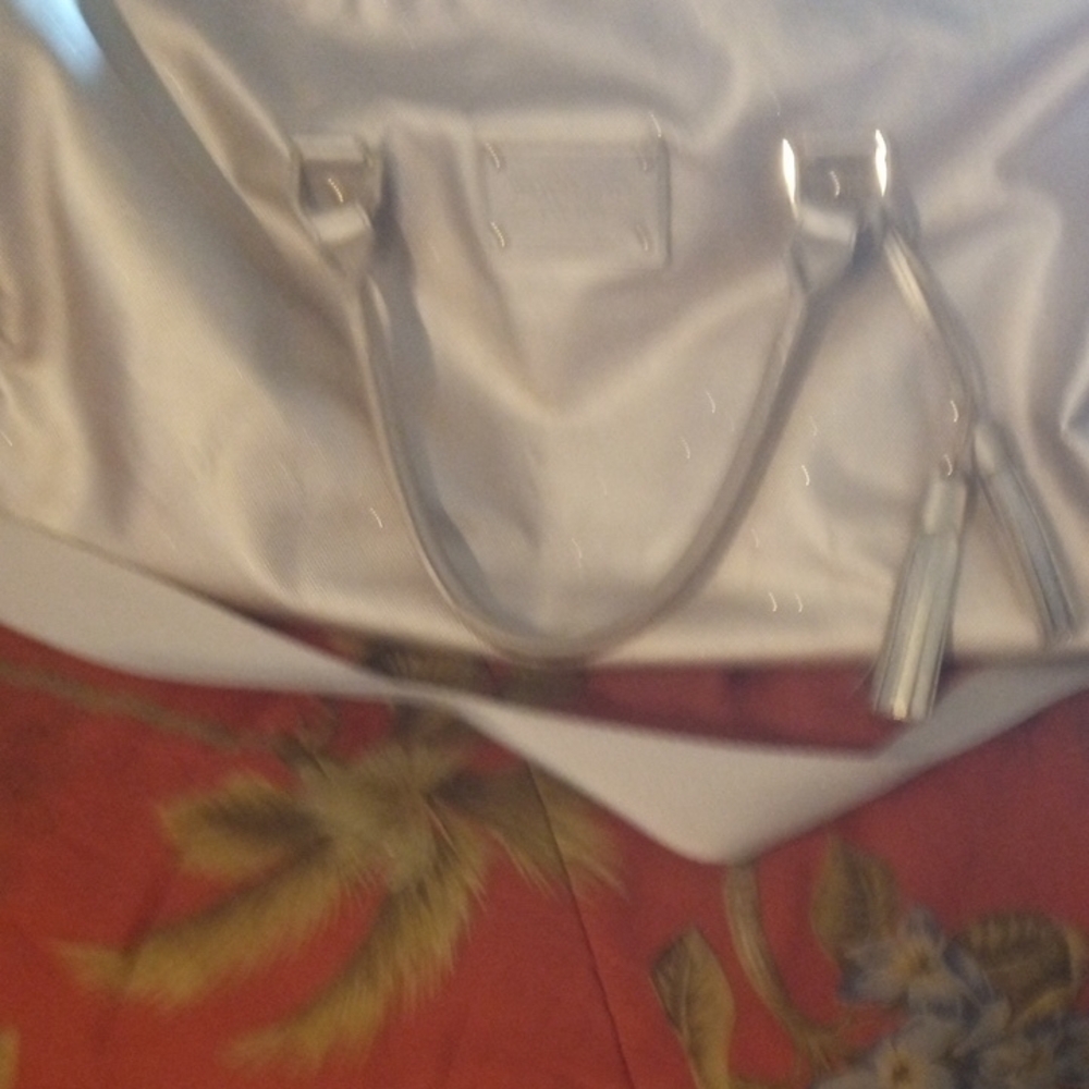 Michael Kors Silver Tote with Tassel Charm